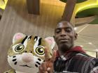 Taking a selfie in front of a cat statue