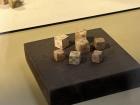 Ancient dice found at the Colosseum that would have been used by Romans.