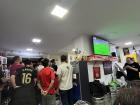 This is a picture inside of a tapas bar during the "El Derbi de Sevilla."  