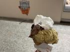 Chocolate and pistachio with cream on top, my go-to gelato order