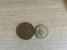 These are pence--coins that are a part of the pound system in Great Britain