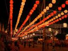 At night, the lights light up the night sky. 