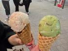 A friend and I eating strawberry and matcha red bean ice cream on the go!