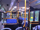 The inside of a blue city bus