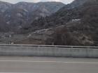 A view of mountains outside of my tour bus window