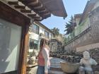 Posing at Bukchon Hanok Village, known for its traditional Korean architecture