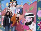 My mom and me in front of a Tunantada mural