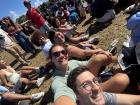 My friends and I sat in the wet grass at the Māori stage to watch kapa haka performances