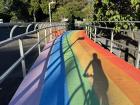 My friend biking on a rainbow bridge!