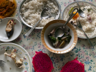 A typical home-cooked lunch: fish, fruit and rice