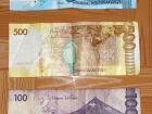 The back of the bills have animals on them, including the whale shark for 100 pesos