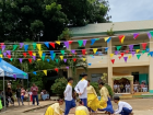 A traditional dance with bamboo sticks performed by students in the Philippines