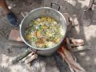 This is a large pot of turkey soup at the farm that somehow tastes better for being cooked over an open flame! 