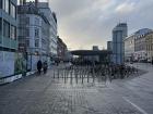A lot of bikes parked outside a popular train station
