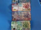 Money in Ghana is different sizes and all very colorful