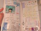 The stewardesses on the flight were very nice and helped me fill out my travel journal!