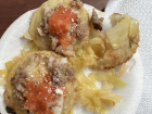 Garnachas, a traditional dish popular for Independence Day, made with fried corn tortillas topped with shredded cabbage, cheese, salsa, refried beans and a meat