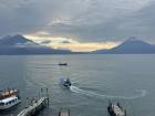 An incredible view of Panajachel, Lake Atitlán with views of Volcán San Pedro, Volcán Tolimán and Volcán Atitlán
