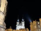 Prague's iconic Týn Church, bathed in the glow of night.