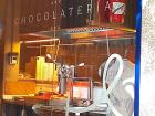 This is the churreria kitchen where they fry the churros/porras in a big pot of oil