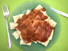 Ravioli is popular and reflects Italian influence due to Italian immigration in the 1850's