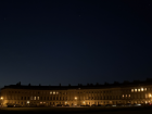 The Royal Crescent in the evening with many visible stars 