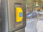 This button isn't red, but you push it to request a stop