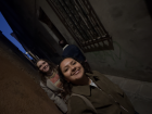 Me and my friend Emma squeezing through the narrow streets at night 
