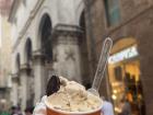 Enjoying hazelnut gelato in Siena, Italy