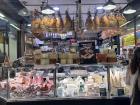 Locals come to buy their meats and cheeses here