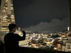 Me taking a photo of Coit Tower and Transamerica Pyramid