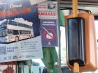 A bus sign saying "forbidden to drink mate"