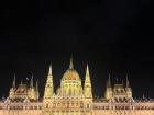 Night boat tour in Budapest looking at the Hungarian Parliament Building