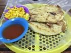 Pupusas with salsa and curtido