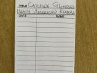 When a student checks out a book, they write their name and class on this book card, and we also stamp the return date on the book card