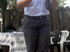 Photo of a police woman addressing the kgotla attendees