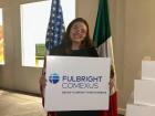 Me posing with a Fulbright sign during our orientation in Mexico City