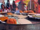 Food vendors in the center of town cooking quesadillas, pambazos, and huaraches