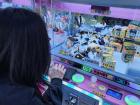 We played on a claw machine during one of our trips