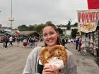 My friend Hailey and I splitting a really big cheese pretzel at Oktoberfest in Germany