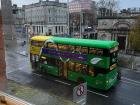 A rare photo of an empty street and double-decker bus on a rainy morning in Dublin!