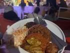 Enjoying some Ghanaian Jollof Rice and Fried Plantain at a famous Berlin market