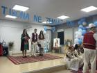 Students dressed in traditional Albanian clothing for a special activity celebrating the liberation of Tirana