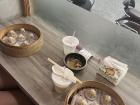 Xiaolongbao, or soup dumplings, with friends after work