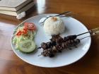 "Sate ayam" (grilled chicken)