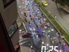 A group of motorcyclists on a midnight ride through Quito