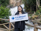 A photo of me visiting a waterfall in Da Lat, Vietnam. It was refreshing to feel the cool water and mist from the falls