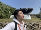Imitating a fish statue at Nanliao Harbor
