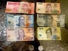 Here are Indonesian rupiahs! This is missing the 20,000 rupiah bill (which is green) and the 500 and 200 rupiah coins (which are silver)