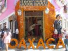 The word “Oaxaca” spelled out in golden cempasúchil lit up the street with color and fragrance, a living tribute to the city’s beauty and the spirit of Día de los Muertos